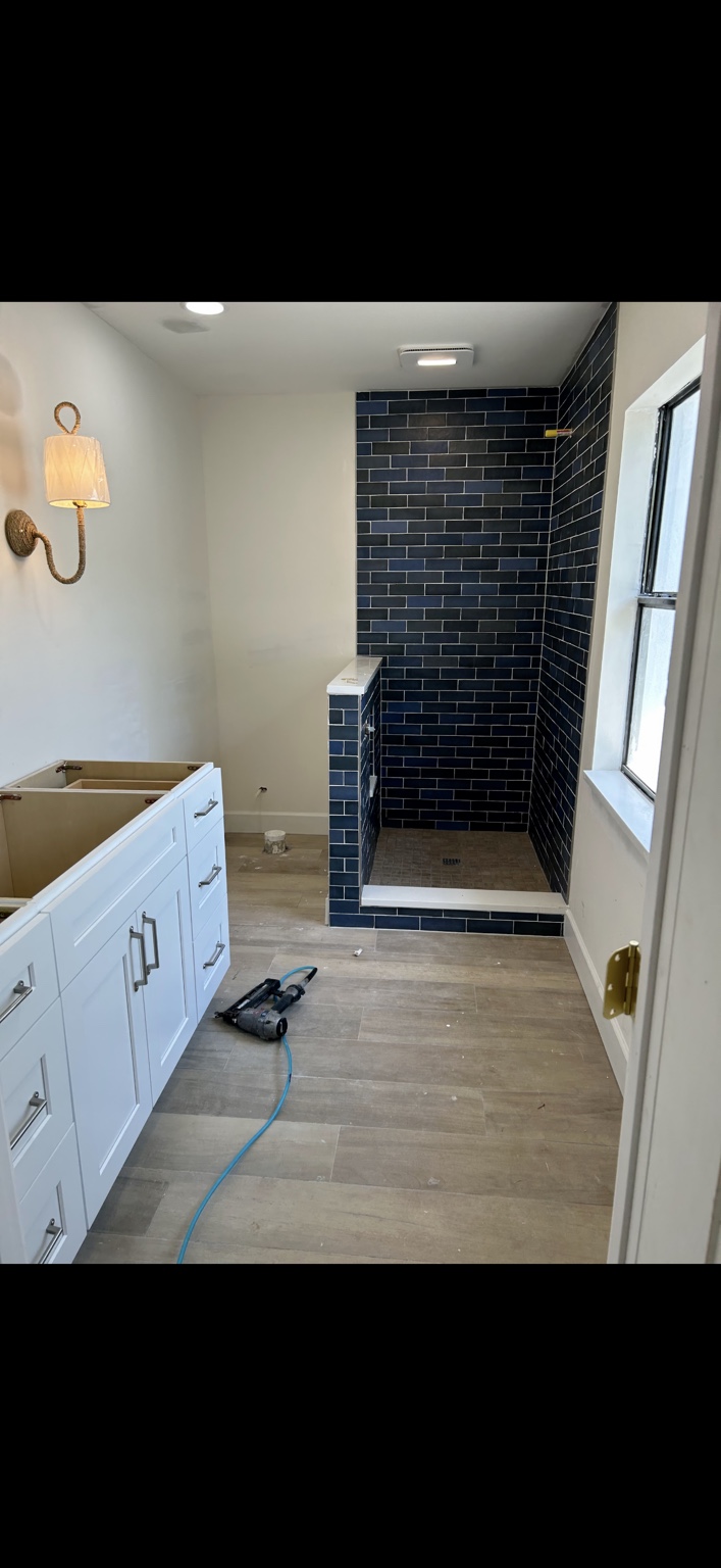 Blue tile shower in progress